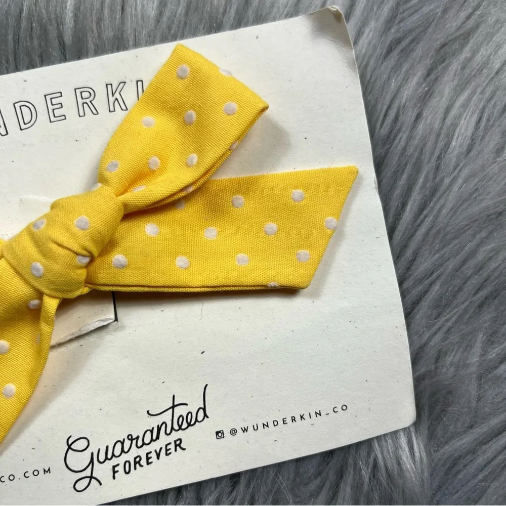 Wunderkin yellow Swiss dot bow clip